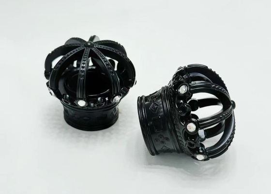 購入 エコフレンドリーなパッケージングのための精巧なダイヤモンドブラックザマック香水ボトルキャップ online manufacture