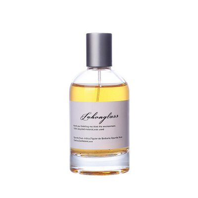 香水瓶30ml 50ml 100mlの円形のガラス スプレーの香水瓶の女性の銀製の帽子が付いている贅沢な空の香水瓶